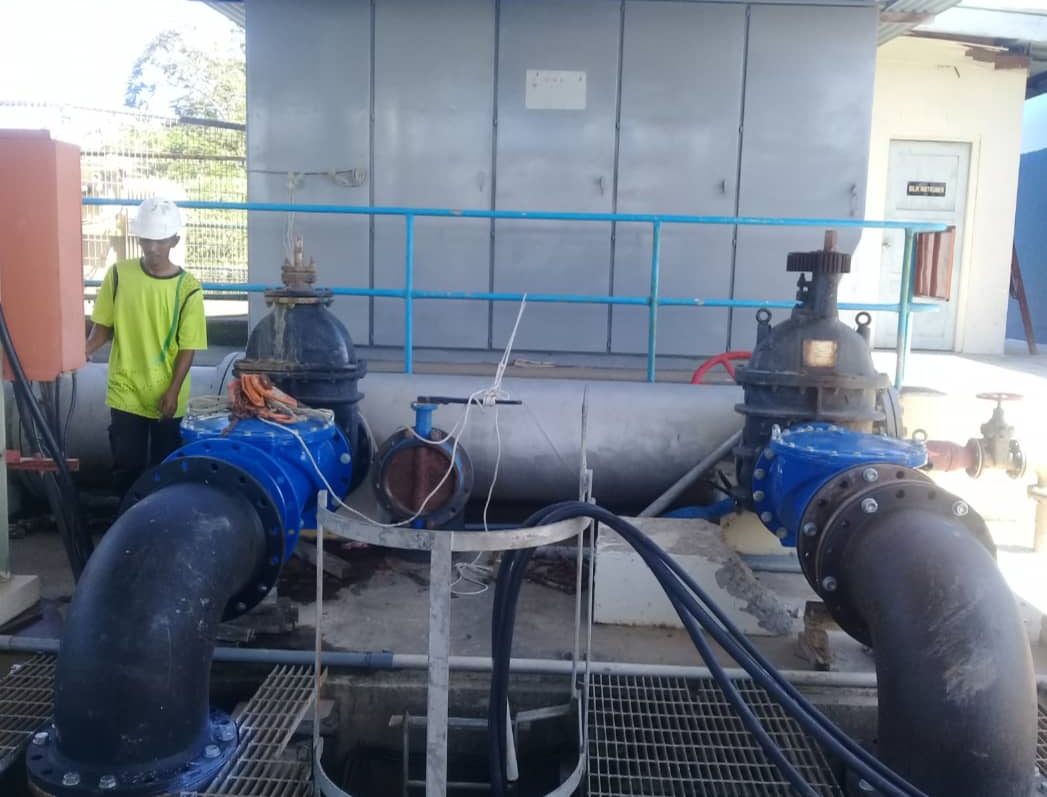 Water pump station with valves and pipework